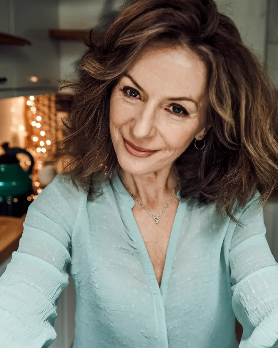 Haircuts for women over 60 years old - autumn 2025, a soft furry forehead with cozy layers