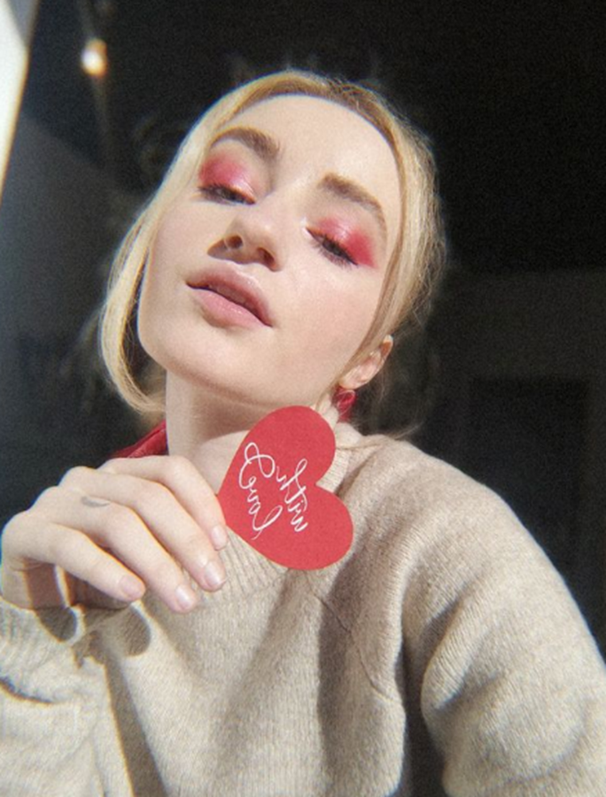 Beautiful makeup with red shadows