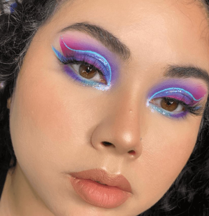 Stylish silky glowing blue pink colorful eye shadow